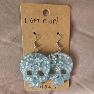 Light It Up Blue Star Skull Earrings
